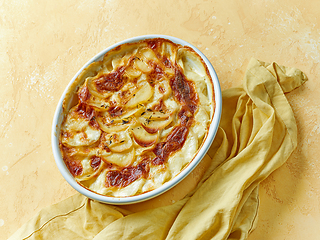 Image showing bowl of freshly baked potato gratin