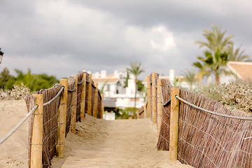 Image showing backyard gate to Marbella beach