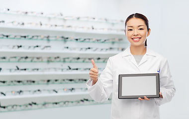 Image showing asian female doctor with tablet pc shows thumbs up