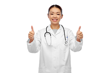 Image showing smiling asian female doctor showing thumbs up