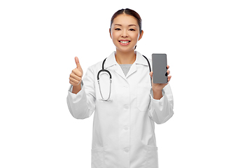 Image showing asian doctor with smartphone showing thumbs up