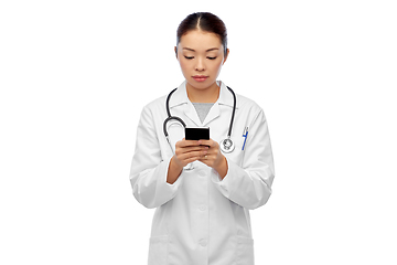 Image showing asian female doctor or nurse with smartphone