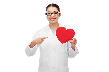 Image showing happy smiling asian female doctor with red heart