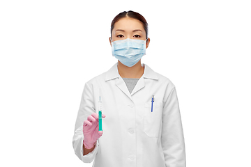 Image showing asian doctor in mask with medicine in syringe