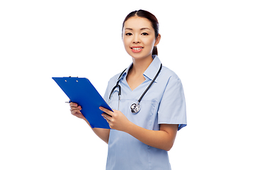 Image showing happy smiling asian female doctor with clipboard