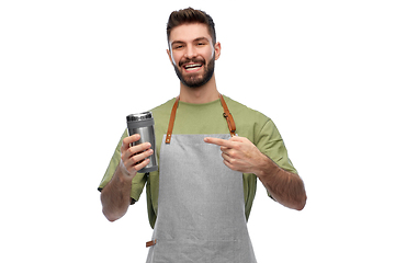 Image showing happy waiter with tumbler or takeaway thermo cup