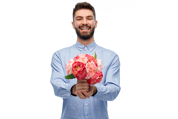 Image showing happy smiling man with bunch of flowers