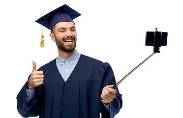 Image showing male graduate student with smartphone takes selfie