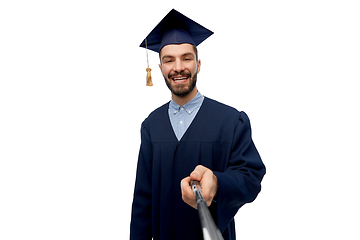 Image showing male graduate student taking selfie with monopod