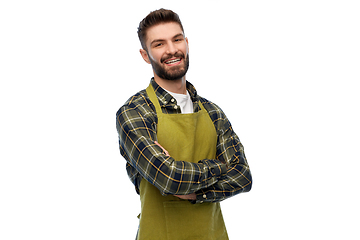 Image showing happy young male gardener or farmer in apron