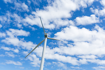 Image showing Wind turbine with blue sky