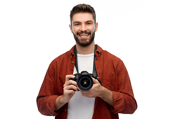 Image showing smiling man or photographer with digital camera