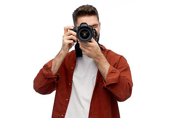 Image showing smiling man or photographer with digital camera