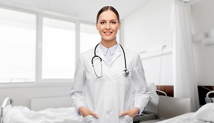 Image showing happy smiling female doctor at hospital