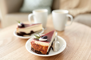Image showing piece of chocolate cake on wooden table