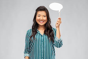 Image showing happy asian woman holding speech bubble