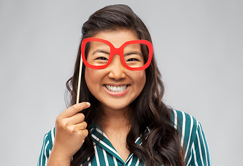 Image showing happy asian woman with big party glasses