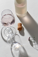 Image showing wine glasses and champagne bottle dropping shadows