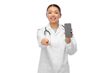 Image showing happy asian female doctor or nurse with smartphone