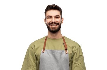 Image showing happy smiling barman in apron