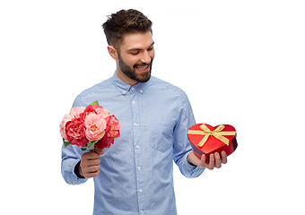 Image showing happy man with flowers and valentine's day gift