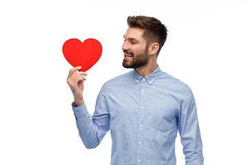 Image showing happy smiling young man with red heart