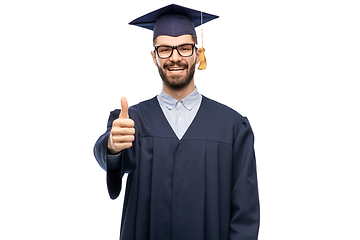 Image showing happy male graduate student showing thumbs up