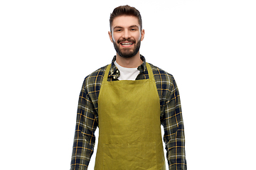 Image showing happy young male gardener or farmer in apron