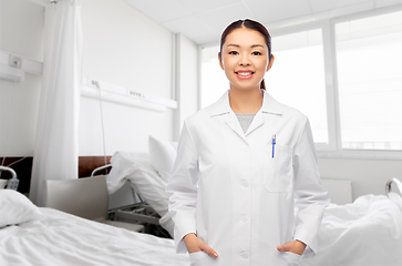 Image showing happy smiling asian female doctor at hospital