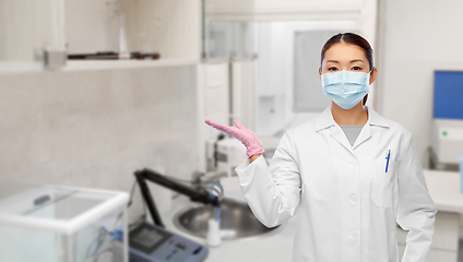 Image showing asian female doctor or scientist in medical mask