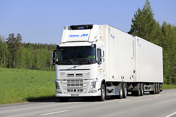 Image showing Big White Volvo Refrigerated Transport Truck on Road