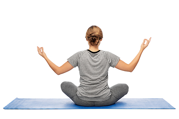 Image showing woman doing yoga in lotus pose