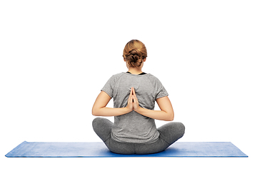 Image showing woman doing reverse prayer pose on mat