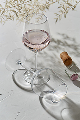 Image showing wine glasses dropping shadows on white surface