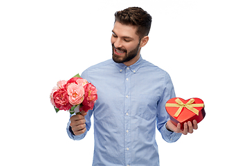 Image showing happy man with flowers and valentine's day gift