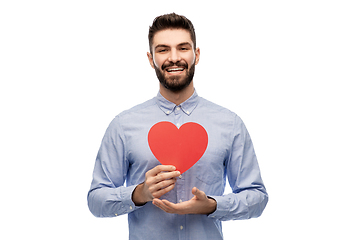 Image showing happy smiling young man with red heart