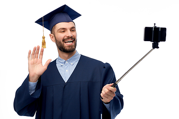 Image showing male graduate student with smartphone takes selfie