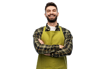 Image showing happy young male gardener or farmer in apron