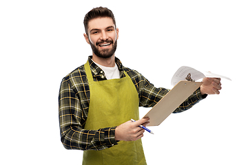 Image showing happy male gardener with clipboard