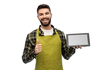 Image showing happy male farmer with tablet pc showing thumbs up