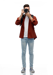 Image showing smiling man or photographer with digital camera