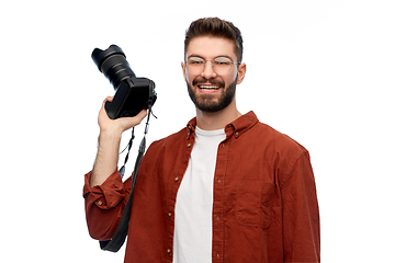 Image showing smiling man or photographer with digital camera