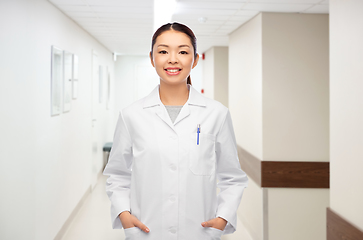 Image showing happy smiling asian female doctor at hospital