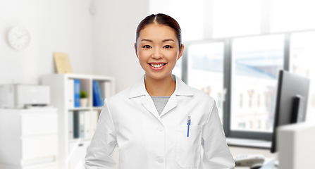 Image showing happy smiling asian female doctor at hospital