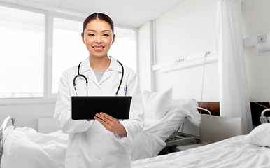 Image showing asian female doctor with tablet pc at hospital