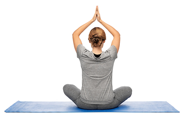 Image showing woman doing yoga in lotus pose