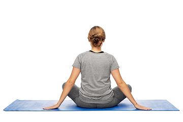 Image showing woman doing yoga on mat