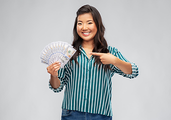 Image showing asian woman with hundred dollar money banknotes