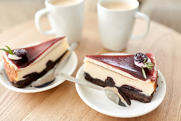 Image showing piece of chocolate cake on wooden table