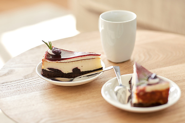 Image showing piece of chocolate cake on wooden table